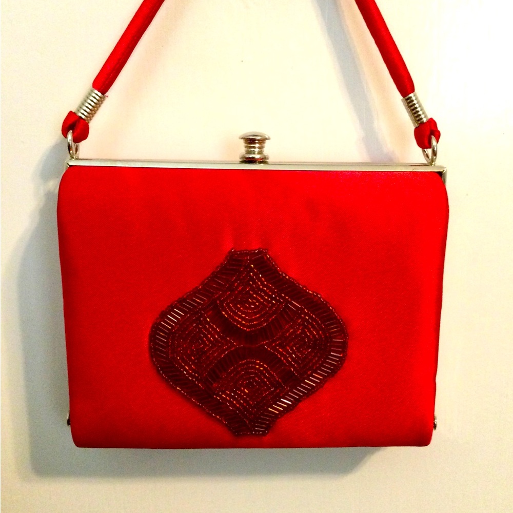 Perfect little Ruby red party purse. New w/o tag.